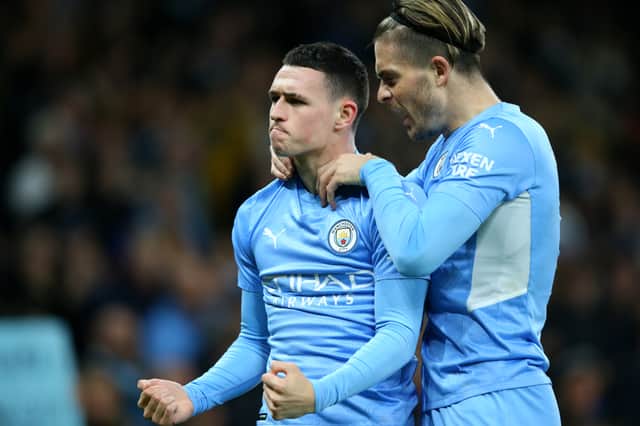 <p>Phil Foden and Jack Grealish celebrate a goal in the recent win over Leeds. Credit: Getty.</p>