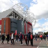 Fans gather outside Old Trafford. Credit: Getty.