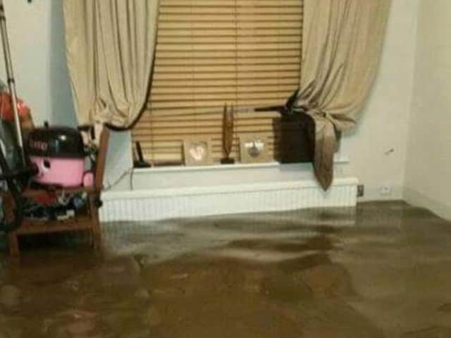 Floodwater inside Keri Muldoon’s home