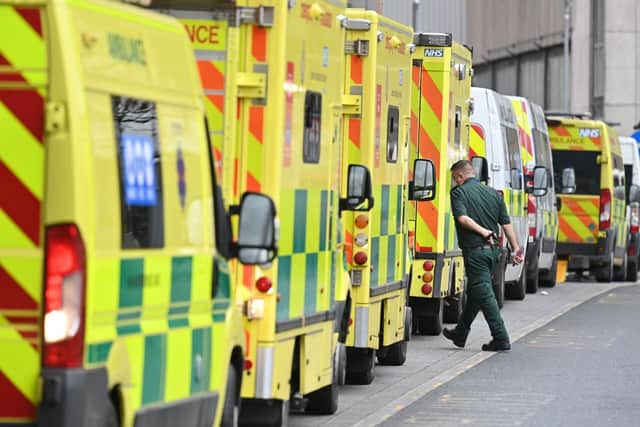 Long waits for patients to be transferred from ambulances into hospitals declined in the latest week of data. Photo: AFP via Getty Images 