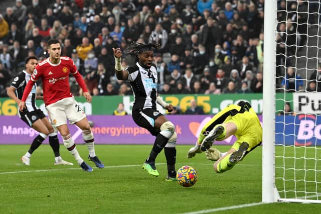 David De Gea dives to stop Allan Saint-Maximin. Credit: Getty.
