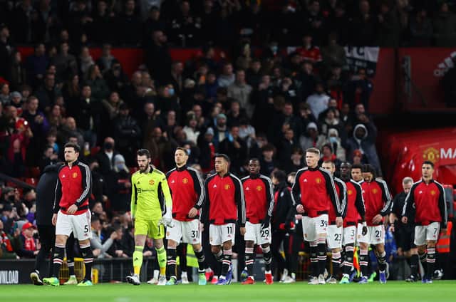 Manchester United players walk out onto the pitch. Credit: Getty.
