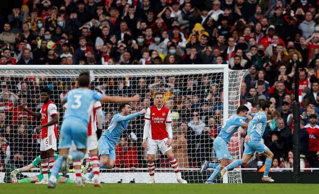 Rodri celebrates his late winner at the Emirates. Credit: Getty.