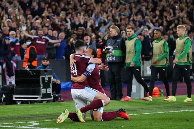 Declan Rice of West Ham United celebrates with team mate Mark Noble (Photo by Craig Mercer/MB Media/Getty Images)