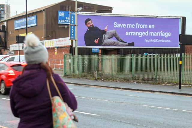 One of the billboards by Muhammad Malik Credit: SWNS