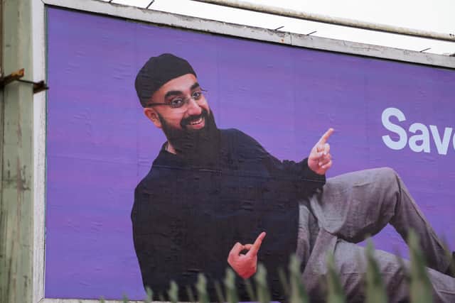 One of the billboards by Muhammad Malik Credsit: SWNS