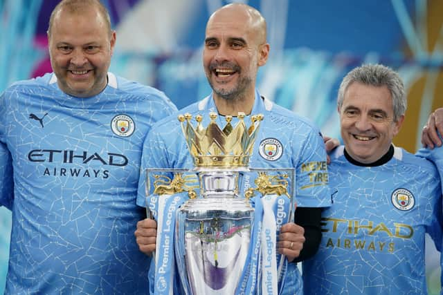 Rodolfo Borrell (left) pictured with Pep Guardiola and Juanma Lillo. Credit: Getty.