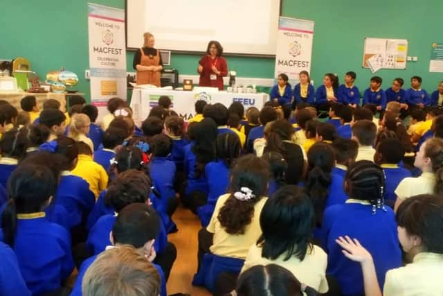 Qaisra Shahraz MBE talking to school pupils as part of Macfest