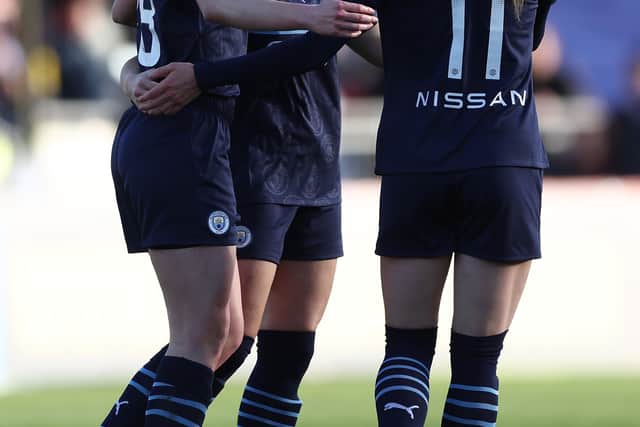 Vicky Losada of Manchester City celebrates with teammates Ellen White and Janine Beckie  Credit: Getty