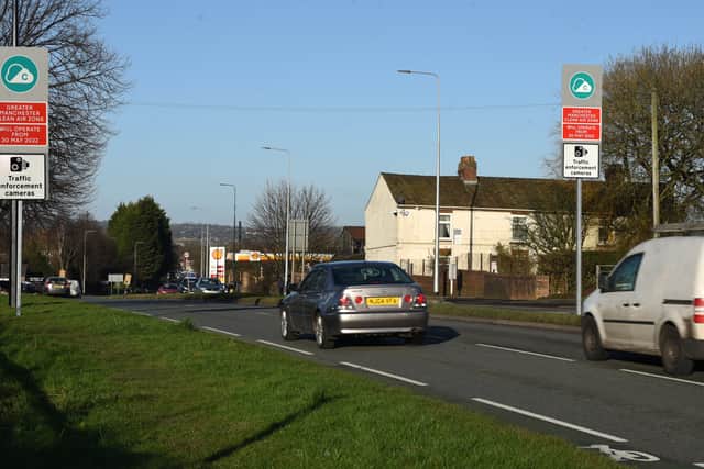 Greater Manchester Clean Air Zone signs  on Warrington Road, Marus Bridge, Wigan
