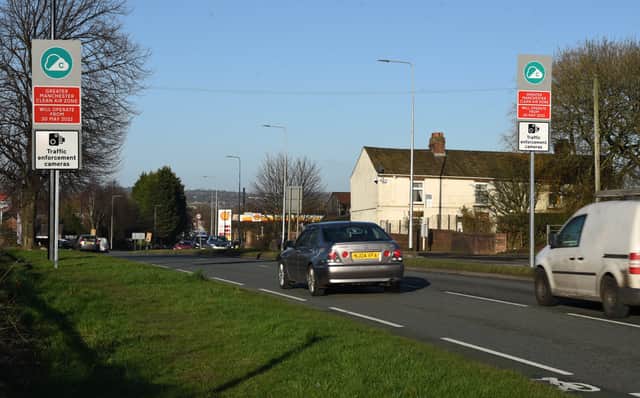 Greater Manchester Clean Air Zone signs  on Warrington Road, Marus Bridge, Wigan