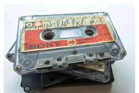 A stack of the Tape Letters cassettes bearing messages British-Pakistani families prepared for their relatives