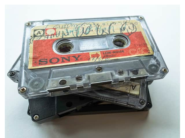 <p>A stack of the Tape Letters cassettes bearing messages British-Pakistani families prepared for their relatives</p>