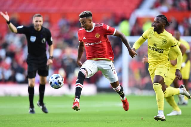 Jesse Lingard of Manchester United runs past Tarique Fosu-Henry of Brentford during the pre-season friendly in July 2021 Credit: Getty