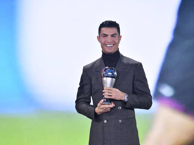 Cristiano Ronaldo receives the FIFA Special Best Men Award 2021 Credit: AFP/Getty