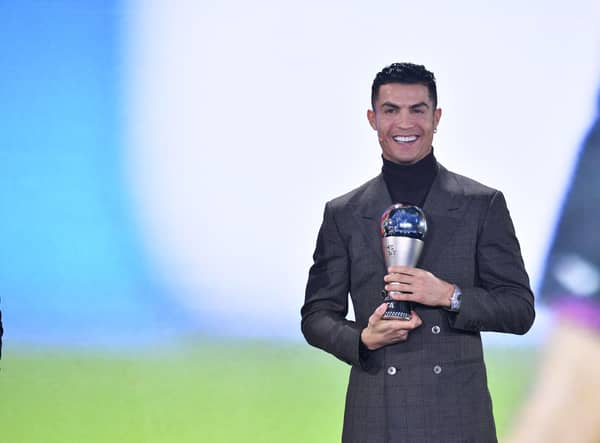 Cristiano Ronaldo receives the FIFA Special Best Men Award 2021 Credit: AFP/Getty