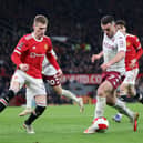 John McGinn faces his international team-mate Scott McTominay. Credit: Getty.