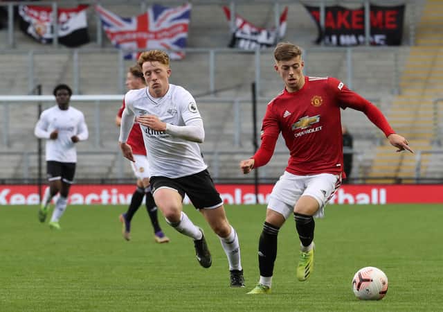 Devine can play in defence or midfield. Credit: Getty.