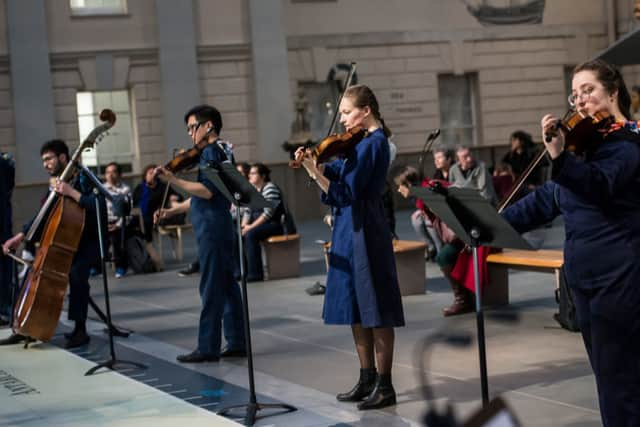 Musicians performing Holly Harding’s work Melting, Shifting, Liquid World