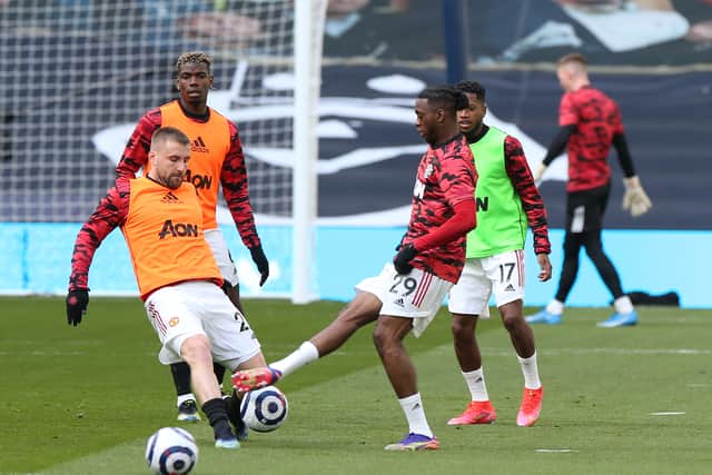 Luke Shaw and Aaron Wan-Bissaka were pictured in United’s latest training images. Credit: Getty.