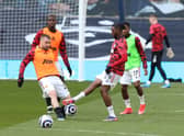 Luke Shaw and Aaron Wan-Bissaka were pictured in United’s latest training images. Credit: Getty.