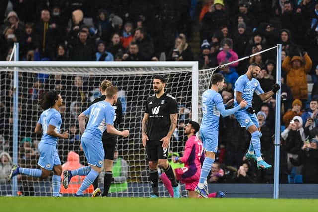 Mahrez scored twice as City move onto the fifth round. Credit: Getty.