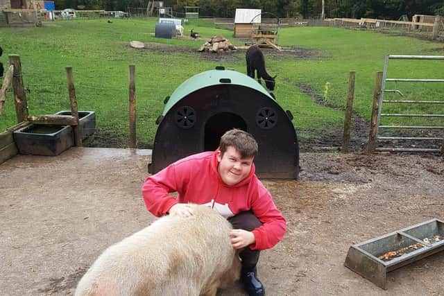 Lewis Rhodes-Marshall who volunteers at The Garden House community farm, in Marple, Stockport Credit: via LDRS