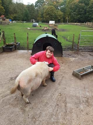 Lewis Rhodes-Marshall who volunteers at The Garden House community farm, in Marple, Stockport Credit: via LDRS