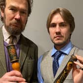 Geoffrey Stafford Charles and Ashley Matthews from Dreweatts auction house with the two truncheons linked to Manchester