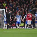 Peter Bankes gives a red card to Brighton’s English defender Lewis Dunk Credit: AFP via Getty Images