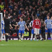 Peter Bankes gives a red card to Brighton’s English defender Lewis Dunk Credit: AFP via Getty Images