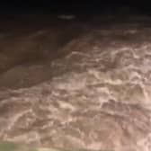 The swollen River Mersey as Environment Agency operate Didsbury Flood Basin Credit: Environment Agency
