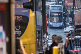 Buses on Oxford Road in Manchester Credit: TFGM