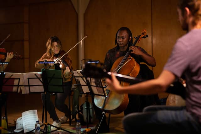 Manchester Collective and Abel Selaocoe performing together. Photo: Manchester Collective