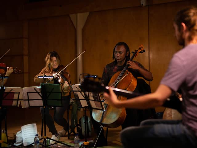 Manchester Collective and Abel Selaocoe performing together. Photo: Manchester Collective