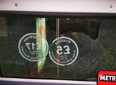 Damage caused to a First Manchester bus by vandalism