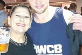 Christopher Hughes from Wigan with his mum, Susan Credit: family/GMP