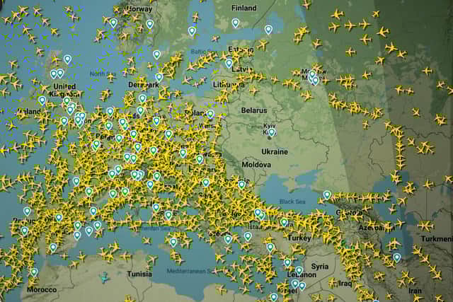 A photo shows a page on the Flightradar 24 website thats shows civilian flights in Europe, on February 24, 2022 in Nantes, western France.