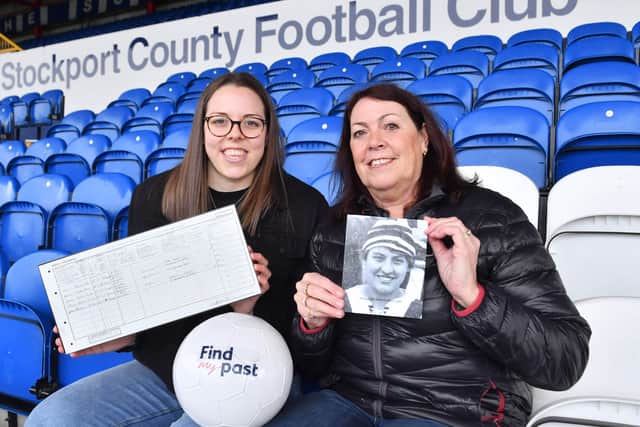 Lauren and Yvonne Quigley at Stockport County’s ground with the 1921 Census record for Alice Woods and a picture of her. Photo: Anthony Devlin/PA Wire (rights held by Findmypast)
