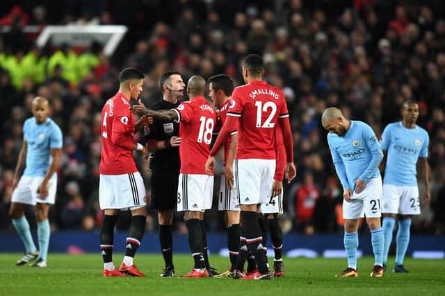 Sunday will be Michael Oliver’s sixth Manchester derby. Credit: Getty.