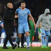 Pep Guardiola and Ruben Dias. Credit: Getty.