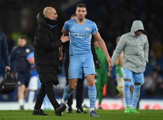 Pep Guardiola and Ruben Dias. Credit: Getty.