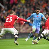 Manchester United will be looking to somehow stop Manchester City on Sunday. Credit: Getty.