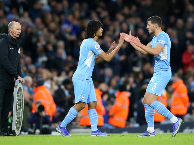 Nathan Ake and Ruben Dias will miss Sunday’s Manchester derby. Credit: Getty.