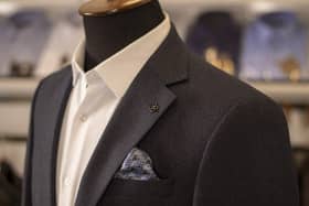 Up-market highstreet menswear chain Moss Bros sells formal wear  