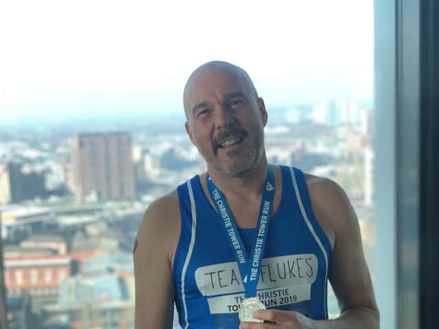 Rich Flukes after completing one of his previous runs up Beetham Tower