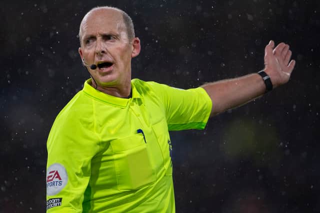 Mike Dean will be the man in the middle at St Mary’s on Sunday. Credit: Getty. 