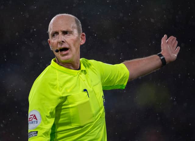 Mike Dean will be the man in the middle at St Mary’s on Sunday. Credit: Getty. 