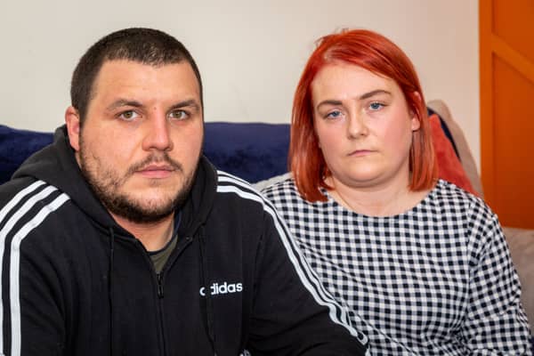 Disgruntled bride-to-be Jade White with her fiance Adam Flitcroft, at their home in Atherton Credit: SWNS