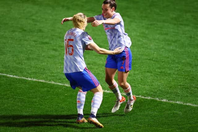 Ella Toone of Manchester United celebrates after scoring their team’s first goal with Diane Caldwell of Manchester United  during the Barclays FA Women’s Super League match with West Ham Credit: Getty